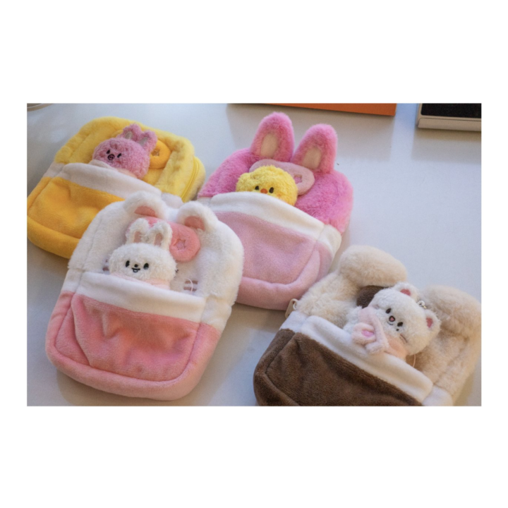 Official lifestyle view of multiple SKZOO Plush Collect Case designs from Stray Kids 6th Fan Meeting.