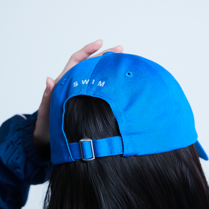BTS SWIM Ball Cap (BLUE) official rear lifestyle view with adjustable strap