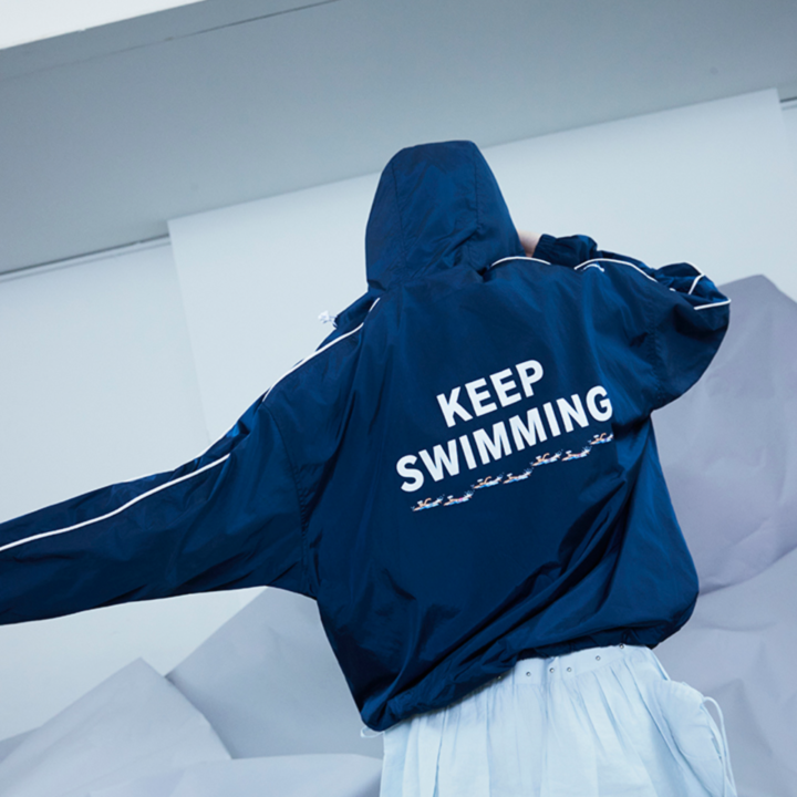 BTS SWIM Wind Jacket (SWIM) official rear lifestyle view