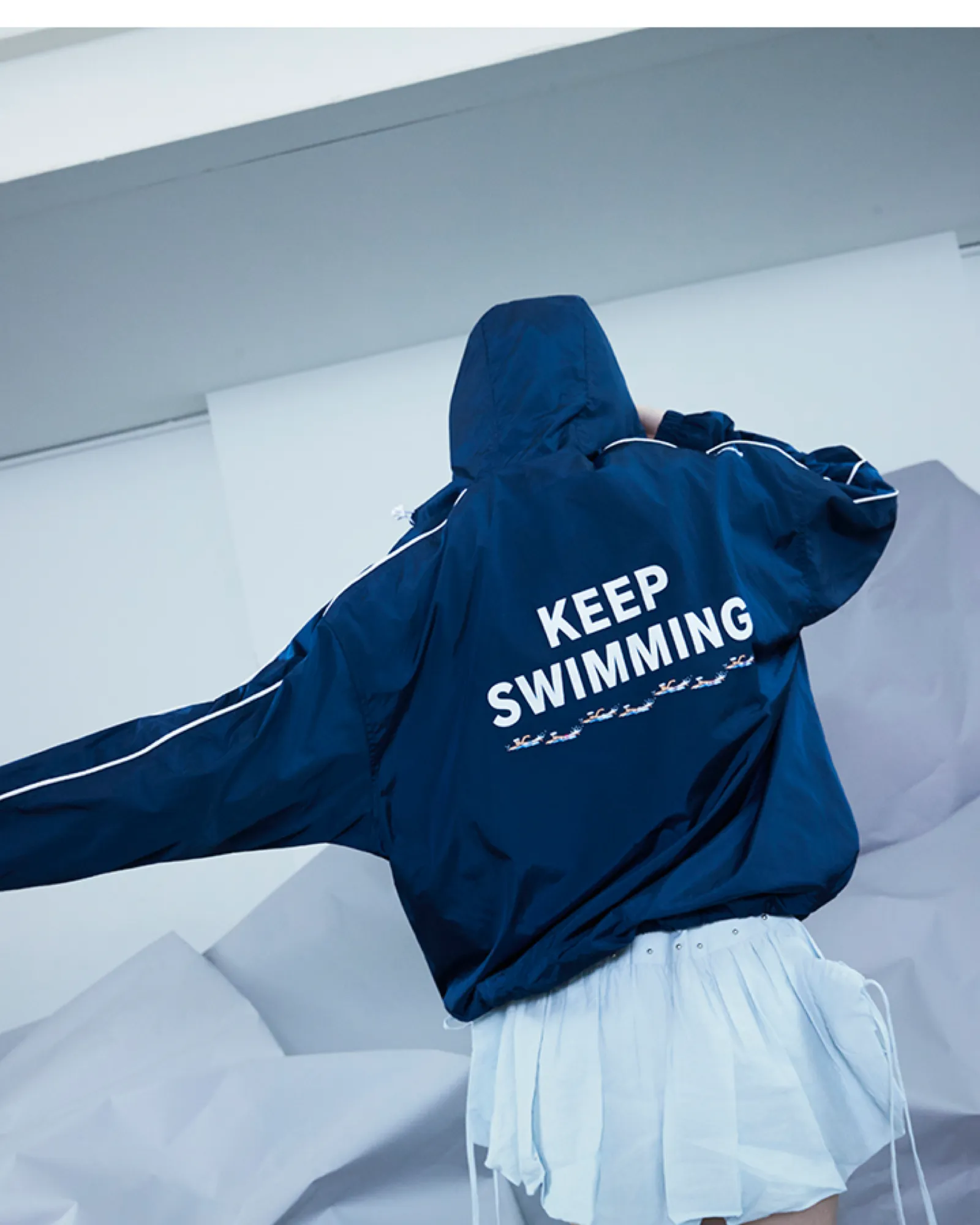 BTS SWIM Wind Jacket (SWIM) official rear lifestyle view