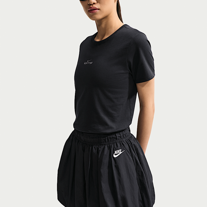 BTS x Nike black T-shirt official three-quarter front model view