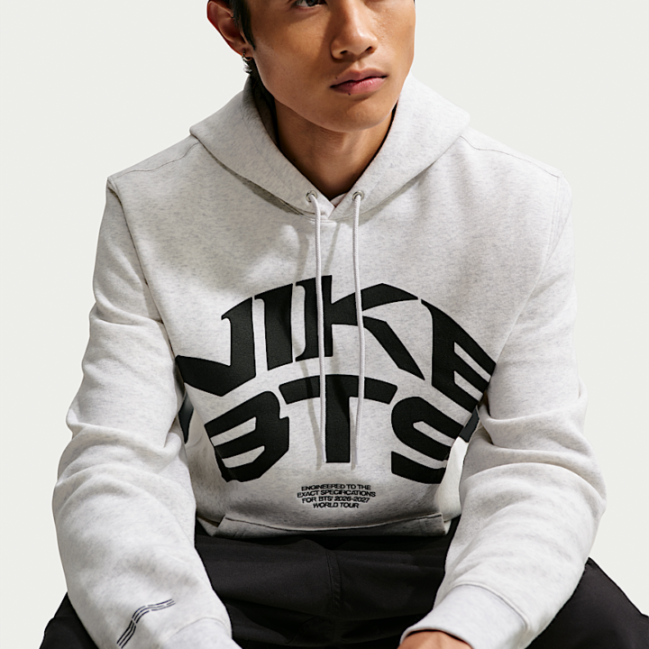 BTS x Nike white hoodie official seated front model view