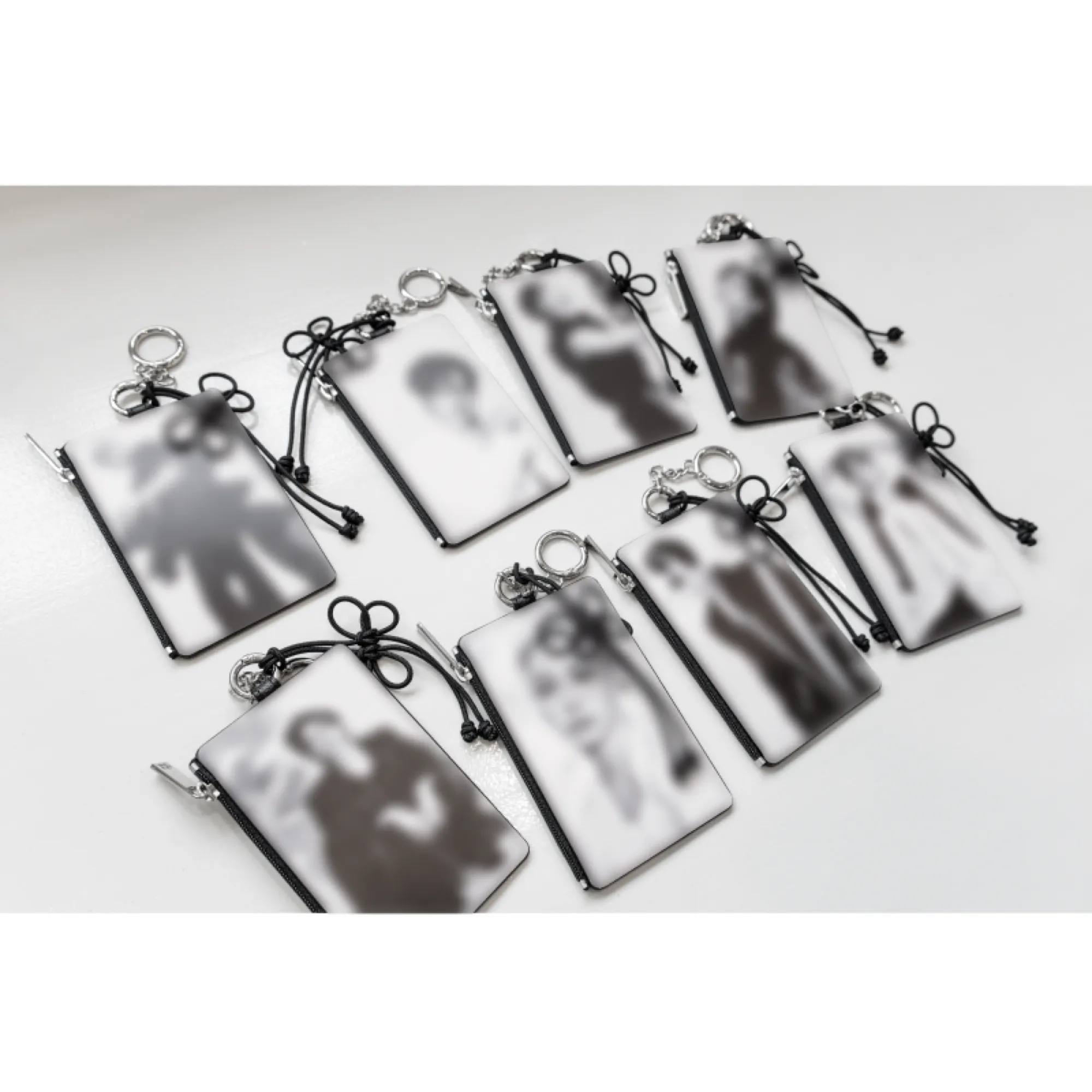 Official full set view of all eight Stray Kids RUN IT Seoul Card Holder Keyring member designs.