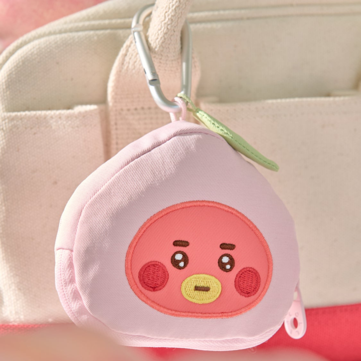 BT21 Peach Holic TATA pink character face pouch with zipper and clip in an official styled display