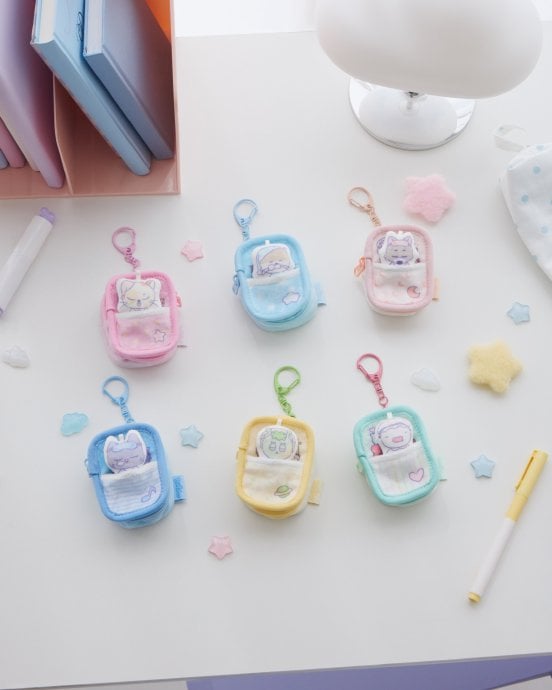 BOYNEXTDOOR BBNEXDO in Sweet Dreams — Mini Plush Pouch product concept photograph