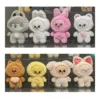 Eight SKZOO plush designs shown in two rows in a JYP FLAGSHIP TOKYO store display